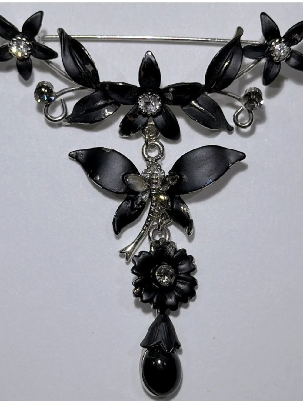 1980s Black & Silver With Rhinestone Flower & Butterfly Brooch